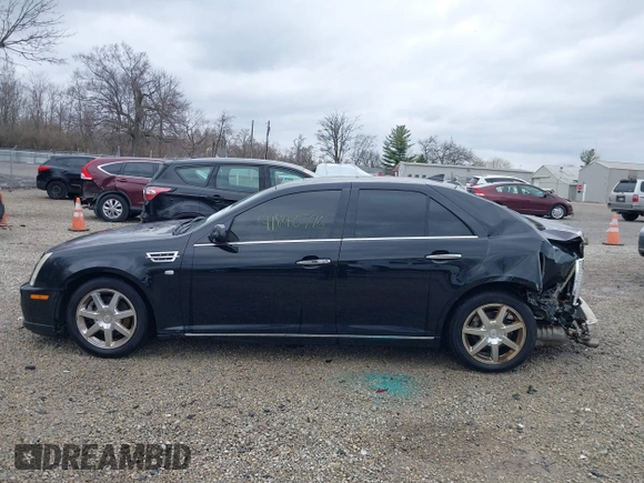2011 Cadillac STS RWD z VIN 1G6DW6ED8B0159384, wystawiony jako IAAI lot #41840796 z przebiegiem 209 953 mil mil oraz . Historia ofert i sprzedaży dostępna na DreamBid. Obrazek 15.