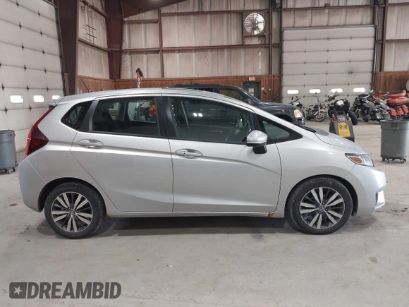 2015 Honda Fit EX-L z VIN 3HGGK5H86FM714030, wystawiony jako IAAI lot #42388380 z przebiegiem 197 414 mil mil oraz . Historia ofert i sprzedaży dostępna na DreamBid. Obrazek 13.