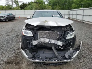 2014 Audi Q5 Premium Plus with VIN WA1DGAFP0EA005265, listed as a Copart auction lot 56697635 with 104,632 mi miles and Salvage title. Bid and sale history available at DreamBid. Image 5.