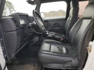 2006 Jeep Wrangler SE with VIN 1J4FA29156P786693, listed as a Copart auction lot 50727035 with 87,544 mi miles and Clean Title. Bid and sale history available at carsss.com. Image 7.