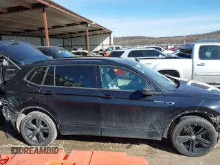 2019 Volkswagen Tiguan SE with VIN 3VV3B7AX2KM075179, listed as a IAAI auction lot 41728654 with 108,388 mi miles and . Bid and sale history available at DreamBid. Image 14.