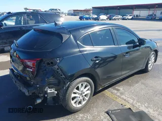 2014 Mazda 3 i Grand Touring z VIN JM1BM1M78E1159912, wystawiony jako IAAI lot #42079661 z przebiegiem 105 039 mil mil oraz . Historia ofert i sprzedaży dostępna na DreamBid. Obrazek 4.