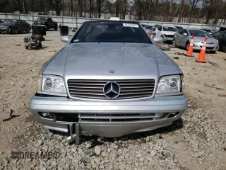 1999 Mercedes-Benz SL-Class with VIN WDBFA68F3XF182706, listed as a Copart auction lot 48736405 with 116,560 mi miles and Salvage Title. Bid and sale history available at carsss.com. Image 5.