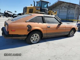 1982 Datsun 280ZX 2+2 z VIN JN1HZ06S8CX428785, wystawiony jako Copart lot #80942274 z przebiegiem 88 574 mil mil oraz Tytuł czysty. Historia ofert i sprzedaży dostępna na DreamBid. Obrazek 3.
