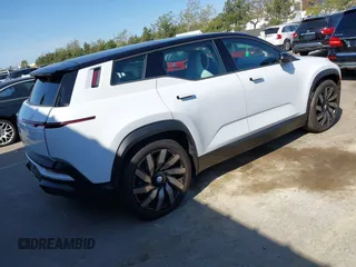 2023 Fisker Ocean Extreme z VIN VCF1EBU22PG009426, wystawiony jako IAAI lot #41963771 z przebiegiem Nie podano mil oraz . Historia ofert i sprzedaży dostępna na DreamBid. Obrazek 4.