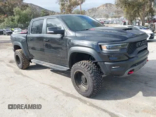 2022 Ram 1500 TRX with VIN 1C6SRFU99NN230521, listed as a IAAI auction lot 41778200 with 19,344 mi miles and . Bid and sale history available at DreamBid. Image 1.