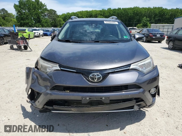 2016 Toyota RAV4 Limited z VIN JTMDFREVXGJ076533, wystawiony jako Copart lot #57480995 z przebiegiem 124 626 mil mil oraz Szkoda całkowita • Salvage title. Historia ofert i sprzedaży dostępna na DreamBid. Obrazek 5.