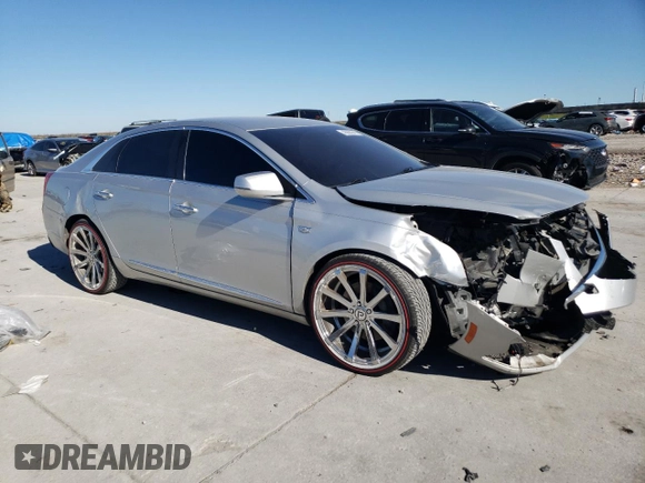 2018 Cadillac XTS with VIN 2G61L5S34J9134469, listed as a Copart auction lot 46660945 with 122,011 mi miles and Salvage Title. Bid and sale history available at carsss.com. Image 4.