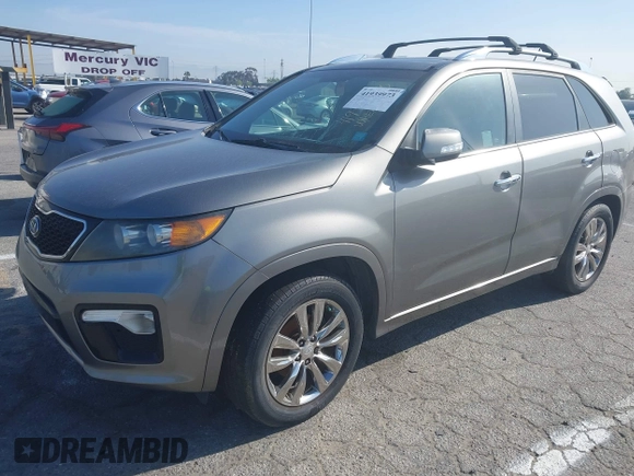 2012 Kia Sorento SX with VIN 5XYKW4A23CG241547, listed as a IAAI auction lot 41939973 with 135,986 mi miles. Bid and sale history available at carsss.com. Image 2.