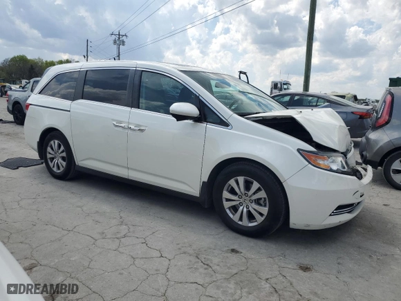 2016 Honda Odyssey EX-L with VIN 5FNRL5H67GB121592, listed as a Copart auction lot 52450025 with 128,651 mi miles and Salvage Title. Bid and sale history available at carsss.com. Image 4.