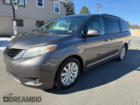 2014 Toyota Sienna LE with VIN 5TDJK3DC4ES074014, listed as a Copart auction lot 48602075 with 284,647 mi miles and Clean Title. Bid and sale history available at DreamBid. Image 2.
