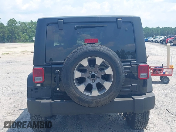 2017 Jeep Wrangler Sport z VIN 1C4AJWAG0HL618140, wystawiony jako IAAI lot #42582104 z przebiegiem 77 883 mil mil oraz . Historia ofert i sprzedaży dostępna na DreamBid. Obrazek 17.