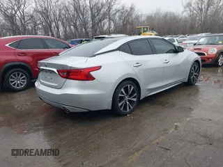2018 Nissan Maxima SL z VIN 1N4AA6AP1JC394078, wystawiony jako IAAI lot #41197428 z przebiegiem 91 281 mil mil oraz . Historia ofert i sprzedaży dostępna na DreamBid. Obrazek 4.