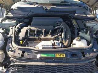 2007 MINI Hardtop S with VIN WMWMF73567TL91385, listed as a IAAI auction lot 41866865 with 114,778 mi miles and . Bid and sale history available at DreamBid. Image 10.