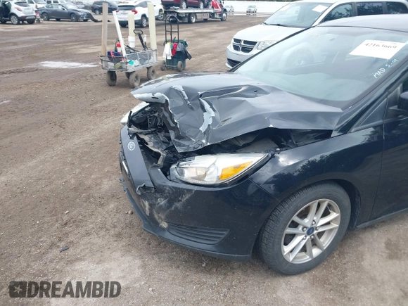 2017 Ford Focus SE with VIN 1FADP3F25HL239809, listed as a IAAI auction lot 42163669 with 140,220 mi miles and . Bid and sale history available at DreamBid. Image 6.