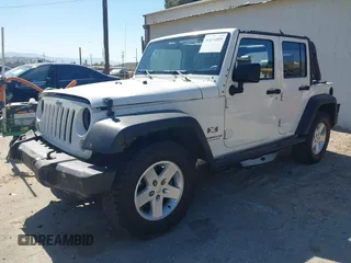 2007 Jeep Wrangler Unlimited X with VIN 1J4GB39147L133997, listed as a IAAI auction lot 41676009 with 110,849 mi miles and . Bid and sale history available at DreamBid. Image 17.