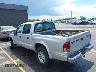 2001 Dodge Dakota with VIN 1B7GG2AX51S167476, listed as a IAAI auction lot 42487594 with 234,228 mi miles and . Bid and sale history available at DreamBid. Image 3.