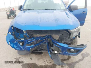 2020 Ford Ranger XL z VIN 1FTER4FH7LLA28302, wystawiony jako IAAI lot #42368065 z przebiegiem 47 176 mil mil oraz . Historia ofert i sprzedaży dostępna na DreamBid. Obrazek 6.