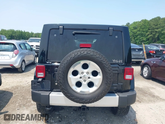 2014 Jeep Wrangler Unlimited Sahara with VIN 1C4BJWEG0EL273086, listed as a IAAI auction lot 42340938 with 121,448 mi miles and . Bid and sale history available at DreamBid. Image 16.