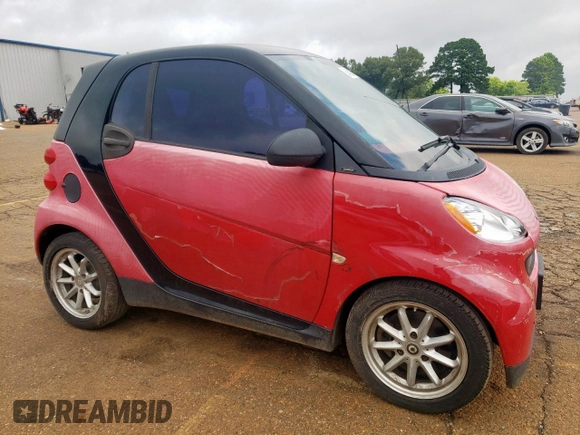2009 Smart fortwo Pure with VIN WMEEJ31X79K271222, listed as a Copart auction lot 64583695 with 152,626 mi miles and Clean title. Bid and sale history available at DreamBid. Image 4.
