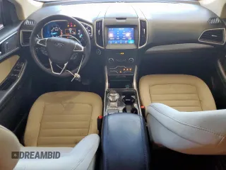 2019 Ford Edge SEL z VIN 2FMPK3J96KBC72783, wystawiony jako Copart lot #57761175 z przebiegiem 153 590 mil mil oraz Czysty tytuł • Clean title. Historia ofert i sprzedaży dostępna na DreamBid. Obrazek 8.