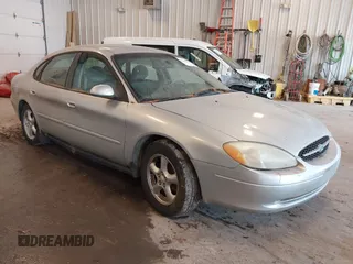 2003 Ford Taurus SE Standard z VIN 1FAFP53UX3A266387, wystawiony jako IAAI lot #42433433 z przebiegiem 161 094 mil mil oraz . Historia ofert i sprzedaży dostępna na DreamBid. Obrazek 1.