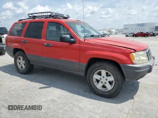 2001 Jeep Grand Cherokee Laredo with VIN 1J4GW48S71C596518, listed as a Copart auction lot 60307805 with 183,787 mi miles and Salvage title. Bid and sale history available at DreamBid. Image 4.