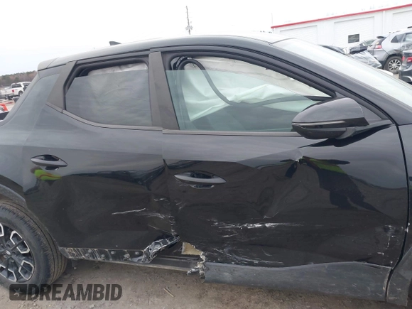 2022 Hyundai Santa Cruz SEL z VIN 5NTJBDAE5NH008011, wystawiony jako IAAI lot #41614699 z przebiegiem 57 484 mil mil oraz . Historia ofert i sprzedaży dostępna na DreamBid. Obrazek 13.