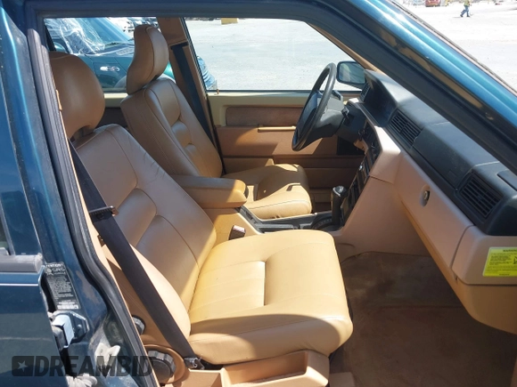 1995 Volvo 900 with VIN YV1JS8313S1197383, listed as a IAAI auction lot 41877807 with 140,298 mi miles and . Bid and sale history available at DreamBid. Image 5.