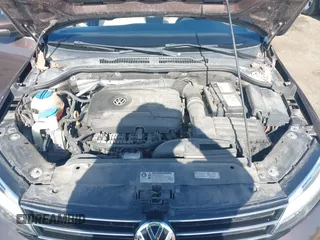 2015 Volkswagen Jetta Sport z VIN 3VWD17AJ5FM411217, wystawiony jako IAAI lot #42563776 z przebiegiem 84 520 mil mil oraz . Historia ofert i sprzedaży dostępna na DreamBid. Obrazek 10.