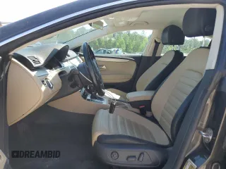 2013 Volkswagen CC Sport Plus z VIN WVWBP7AN7DE515951, wystawiony jako Copart lot #52251575 z przebiegiem 121 414 mil mil oraz Szkody całkowita. Historia ofert i sprzedaży dostępna na DreamBid. Obrazek 7.