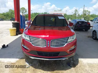 2016 Lincoln MKC Select with VIN 5LMCJ2C98GUJ19751, listed as a IAAI auction lot 42343559 with 88,745 mi miles and . Bid and sale history available at DreamBid. Image 12.