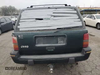 1993 Jeep Grand Cherokee Laredo with VIN 1J4GZ58S7PC125040, listed as a Copart auction lot 78846954 with 149,531 mi miles and Salvage Title. Bid and sale history available at carsss.com. Image 6.