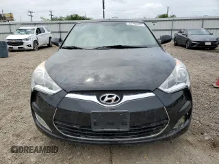 2014 Hyundai Veloster z VIN KMHTC6AD0EU188863, wystawiony jako Copart lot #54750925 z przebiegiem 96 212 mil mil oraz Szkoda całkowita • Salvage title. Historia ofert i sprzedaży dostępna na DreamBid. Obrazek 5.