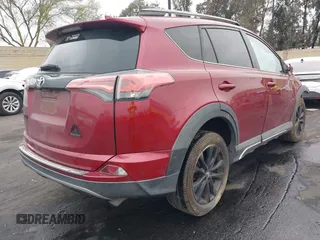 2018 Toyota RAV4 XLE with VIN 2T3RFREVXJW699293, listed as a IAAI auction lot 41881742 with Not Provided miles and . Bid and sale history available at DreamBid. Image 4.