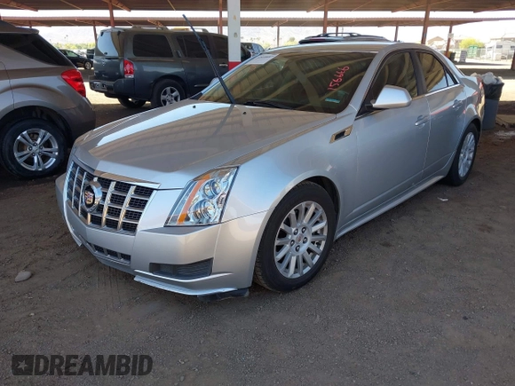 2013 Cadillac CTS Luxury with VIN 1G6DE5E52D0156666, listed as a IAAI auction lot 42058687 with 120,659 mi miles and . Bid and sale history available at DreamBid. Image 2.