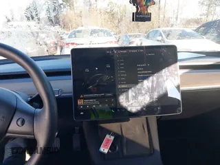 2022 Tesla Model 3 with VIN 5YJ3E1EA9NF147836, listed as a IAAI auction lot 41363603 with 28,748 mi miles. Bid and sale history available at carsss.com. Image 18.