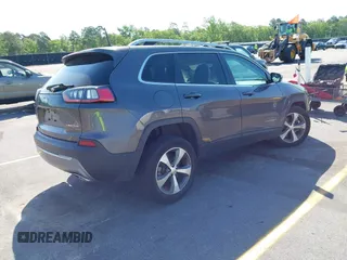 2021 Jeep Cherokee Limited z VIN 1C4PJMDX6MD209395, wystawiony jako IAAI lot #42073746 z przebiegiem 26 627 mil mil oraz . Historia ofert i sprzedaży dostępna na DreamBid. Obrazek 4.
