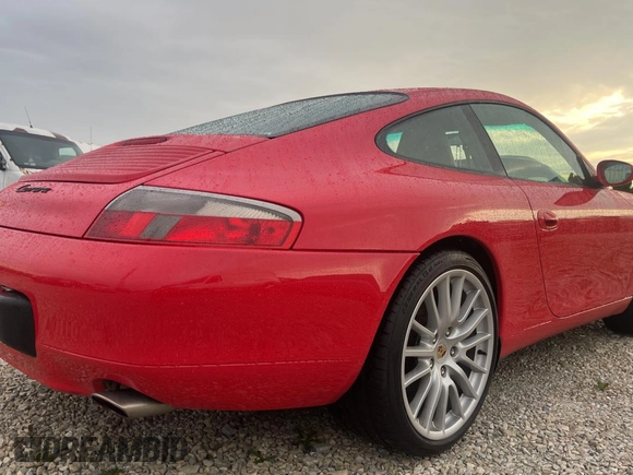 1999 Porsche 911 z VIN WP0AA2991XS620689, wystawiony jako Copart lot #59999925 z przebiegiem 152 508 mil mil oraz Czysty tytuł • Clean title. Historia ofert i sprzedaży dostępna na DreamBid. Obrazek 4.