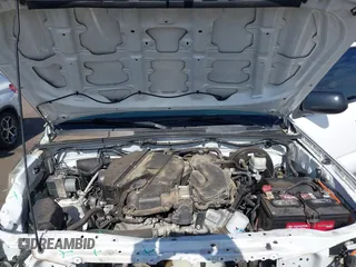 2014 Toyota Tacoma with VIN 3TMMU4FN9EM062808, listed as a IAAI auction lot 41450058 with 192,628 mi miles and . Bid and sale history available at DreamBid. Image 10.