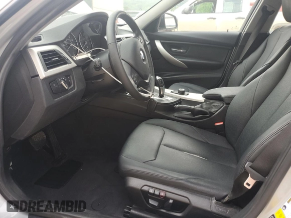 2015 BMW 3 Series 320i xDrive with VIN WBA3C3G5XFNT53779, listed as a Copart auction lot 59126795 with 63,906 mi miles and Salvage title. Bid and sale history available at DreamBid. Image 7.