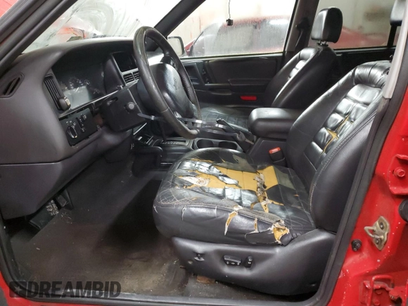 1997 Jeep Grand Cherokee Laredo with VIN 1J4GZ58Y9VC629994, listed as a Copart auction lot 83086694 with 252,147 mi miles and Salvage Title. Bid and sale history available at carsss.com. Image 7.