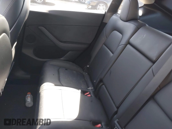 2024 Tesla Model Y with VIN 7SAYGDED8RF213796, listed as a IAAI auction lot 41634130 with 7,710 mi miles and . Bid and sale history available at DreamBid. Image 8.