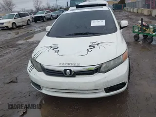 2012 Honda Civic EX-L with VIN 2HGFB2F95CH529693, listed as a IAAI auction lot 41160120 with 194,418 mi miles and . Bid and sale history available at DreamBid. Image 12.