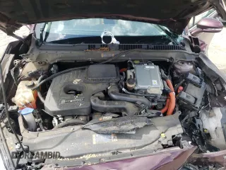 2013 Ford Fusion SE Hybrid z VIN 3FA6P0LU7DR197801, wystawiony jako Copart lot #60468095 z przebiegiem 169 215 mil mil oraz Szkoda całkowita • Salvage title. Historia ofert i sprzedaży dostępna na DreamBid. Obrazek 11.