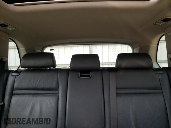 2012 BMW X5 35i z VIN 5UXZV4C55CL753810, wystawiony jako Copart lot #62405565 z przebiegiem 178 504 mil mil oraz Szkoda całkowita • Salvage title. Historia ofert i sprzedaży dostępna na DreamBid. Obrazek 10.