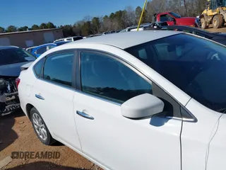 2019 Nissan Sentra S z VIN 3N1AB7AP8KY379747, wystawiony jako IAAI lot #41376492 z przebiegiem 92 328 mil mil oraz . Historia ofert i sprzedaży dostępna na DreamBid. Obrazek 13.