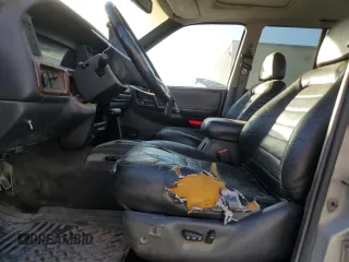 1998 Jeep Grand Cherokee with VIN 1J4FX48S4WC345469, listed as a Copart auction lot 80721224 with 201,543 mi miles and Salvage title. Bid and sale history available at DreamBid. Image 7.