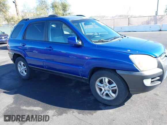 2005 Kia Sportage LX with VIN KNDJF723457057402, listed as a IAAI auction lot 41471742 with 215,565 mi miles and . Bid and sale history available at carsss.com. Image 13.