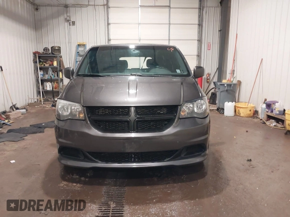 2016 Dodge Grand Caravan SE with VIN 2C4RDGBGXGR219689, listed as a IAAI auction lot 41675960 with 112,045 mi miles and . Bid and sale history available at DreamBid. Image 13.